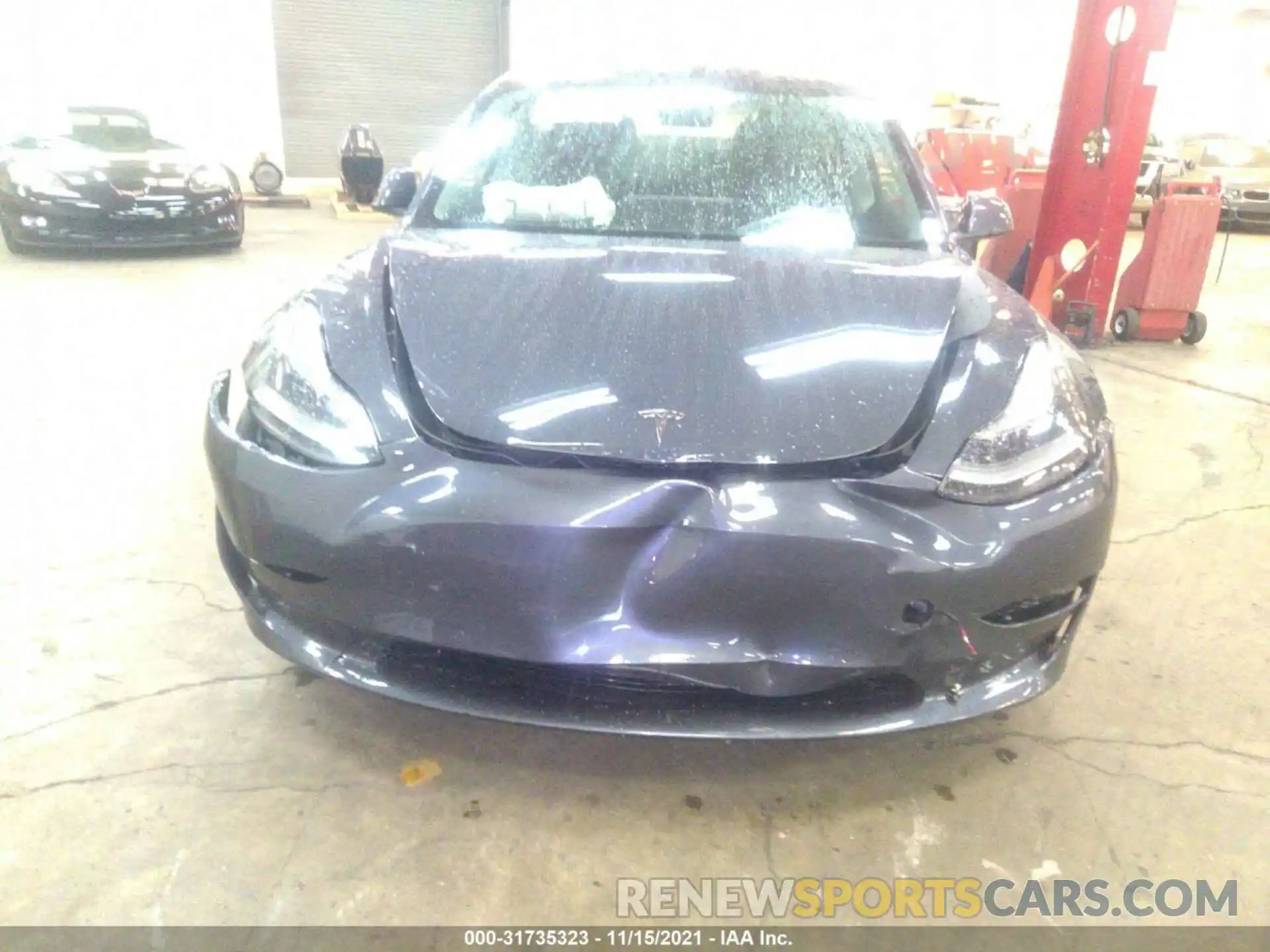 6 Photograph of a damaged car 5YJ3E1EB8NF103223 TESLA MODEL 3 2022