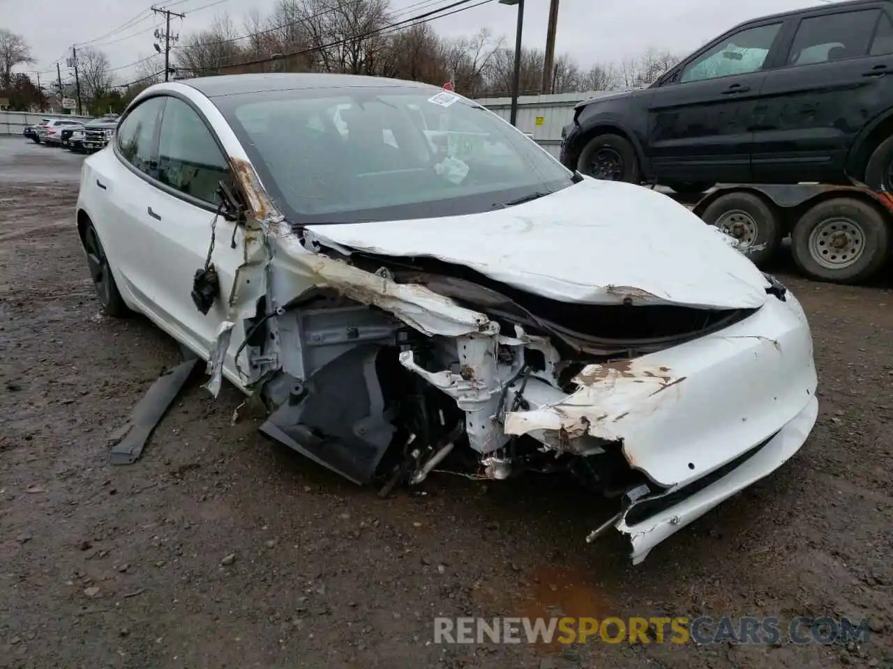 1 Photograph of a damaged car 5YJ3E1EB8NF106915 TESLA MODEL 3 2022