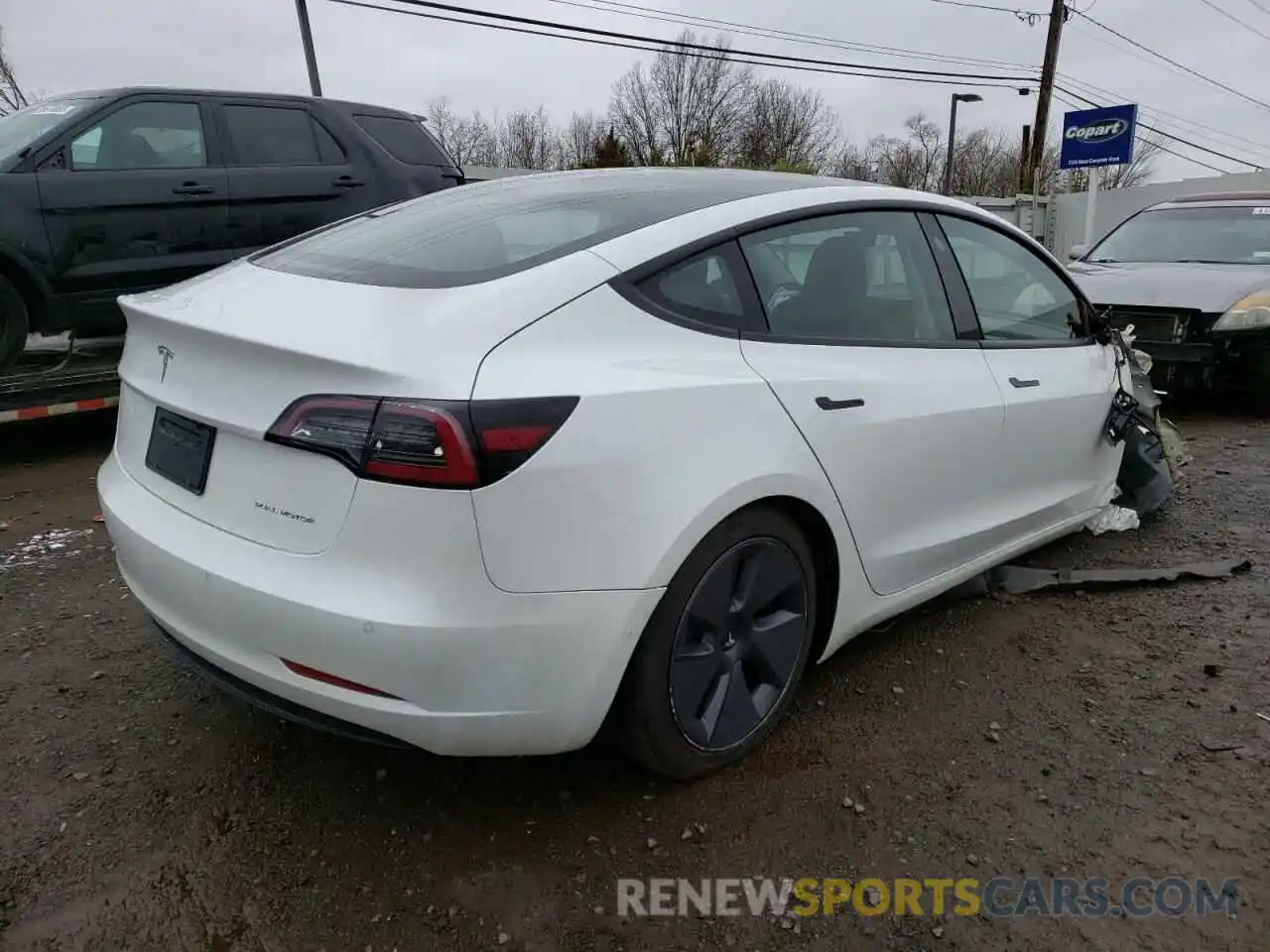 4 Photograph of a damaged car 5YJ3E1EB8NF106915 TESLA MODEL 3 2022