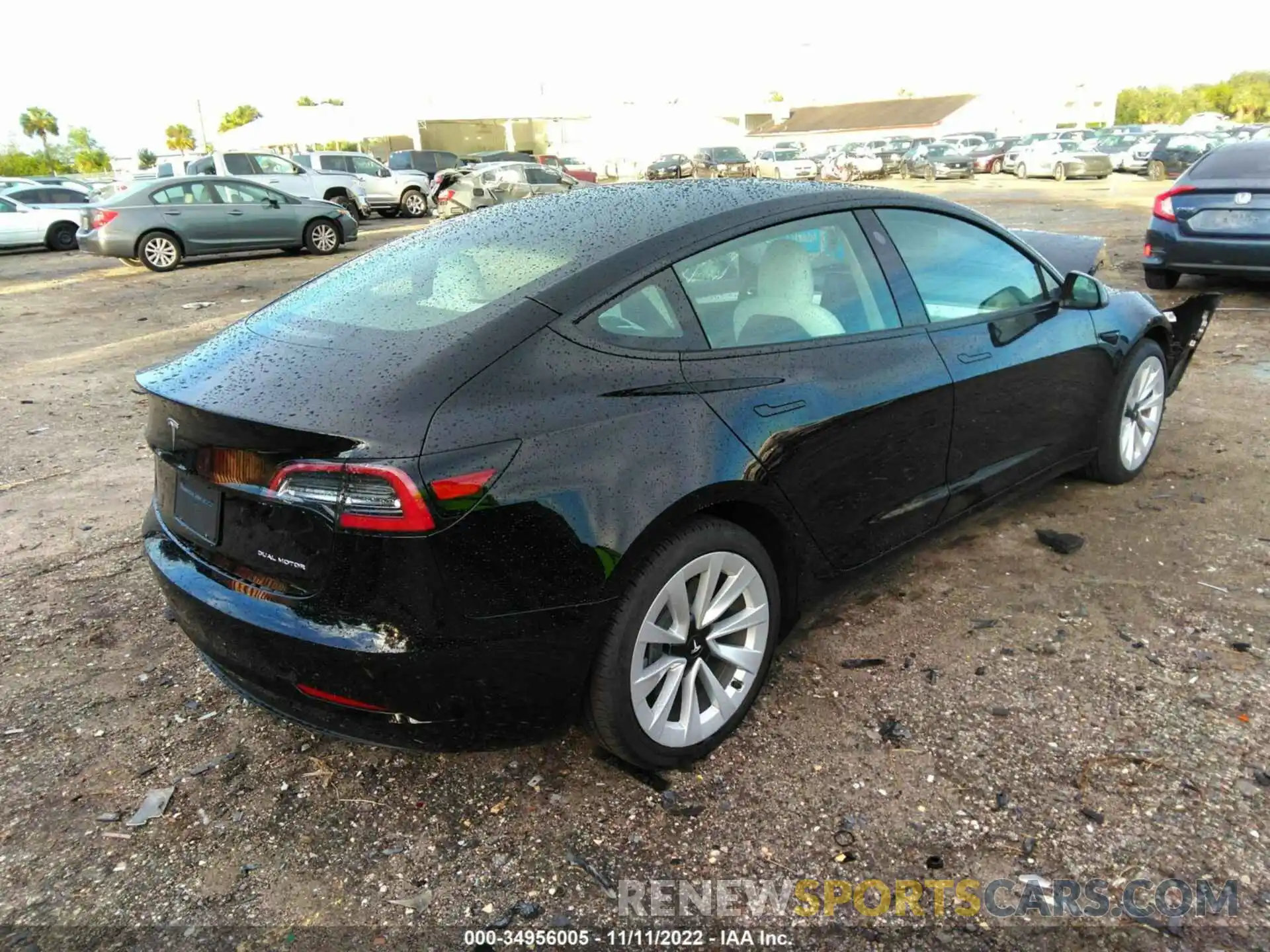 4 Photograph of a damaged car 5YJ3E1EB8NF109605 TESLA MODEL 3 2022