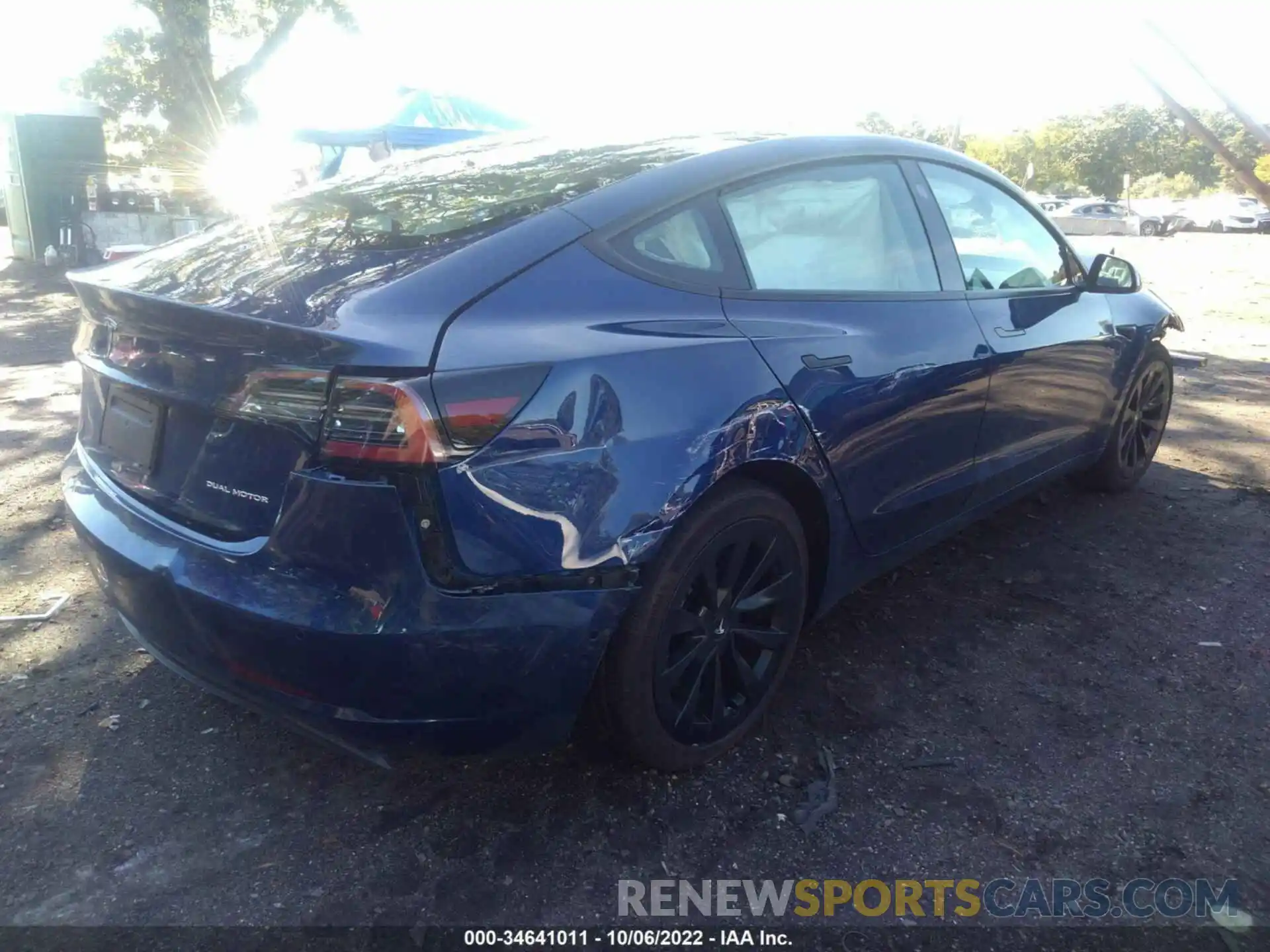 4 Photograph of a damaged car 5YJ3E1EB8NF111032 TESLA MODEL 3 2022