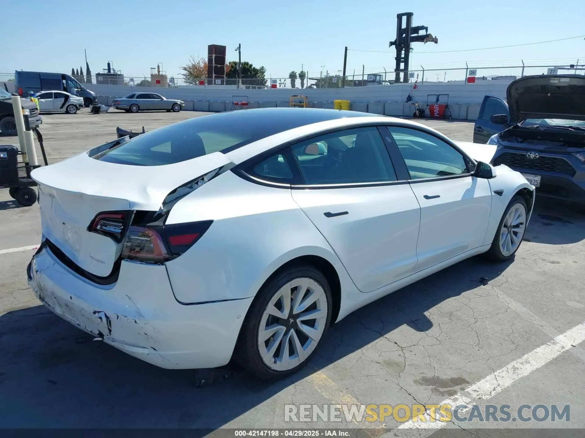 4 Photograph of a damaged car 5YJ3E1EB8NF127361 TESLA MODEL 3 2022