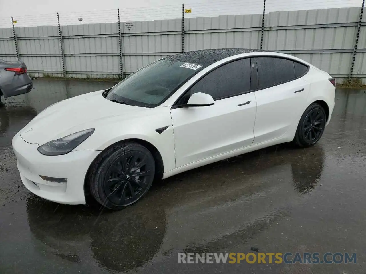 1 Photograph of a damaged car 5YJ3E1EB8NF144421 TESLA MODEL 3 2022