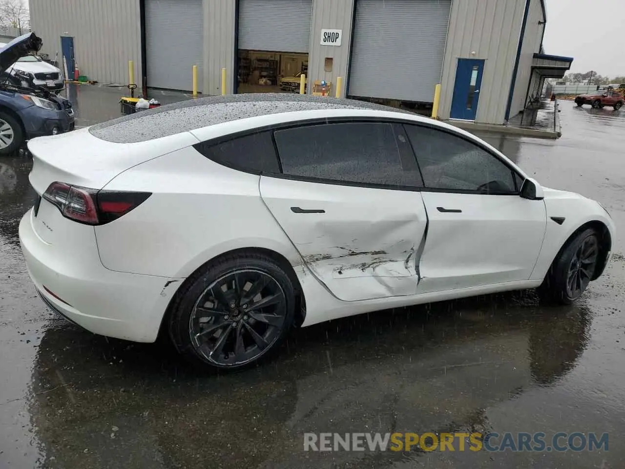 3 Photograph of a damaged car 5YJ3E1EB8NF144421 TESLA MODEL 3 2022