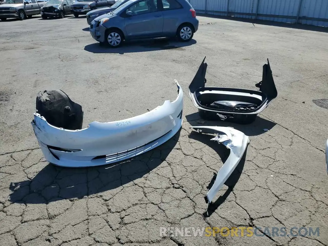 12 Photograph of a damaged car 5YJ3E1EB8NF156195 TESLA MODEL 3 2022
