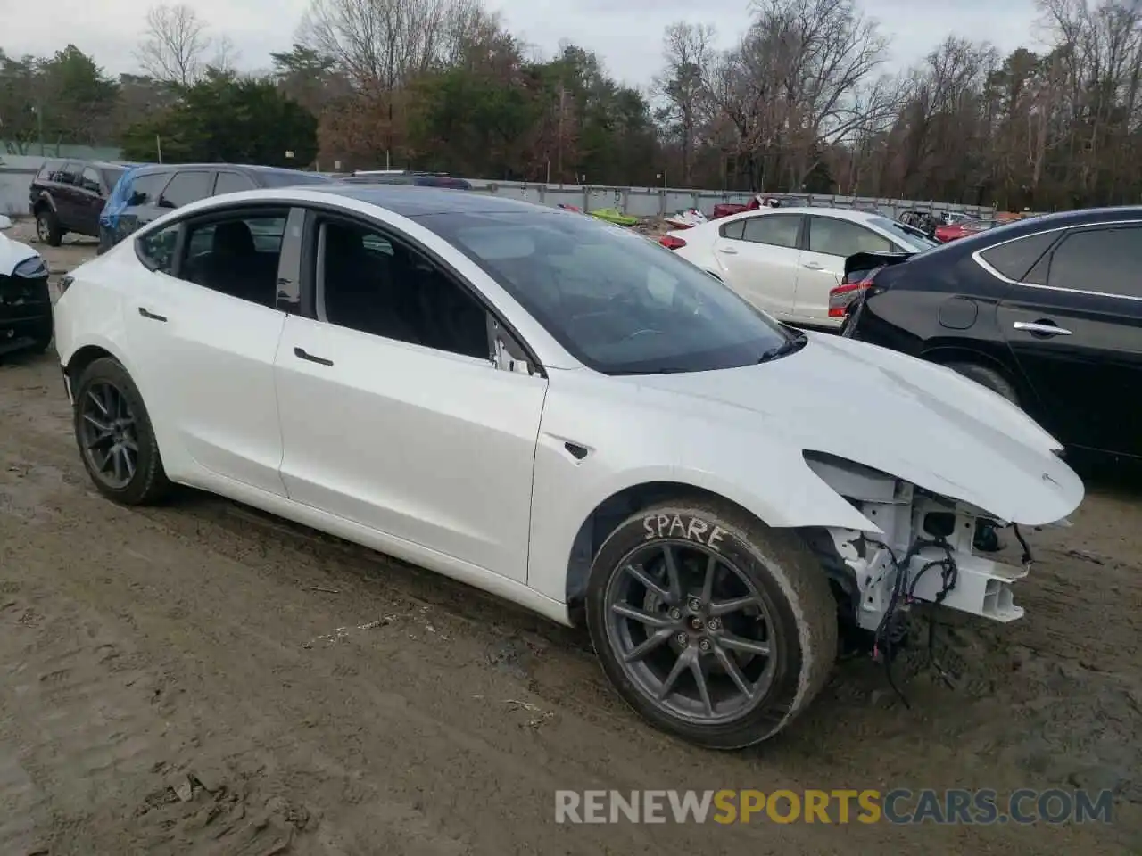 4 Photograph of a damaged car 5YJ3E1EB8NF169741 TESLA MODEL 3 2022