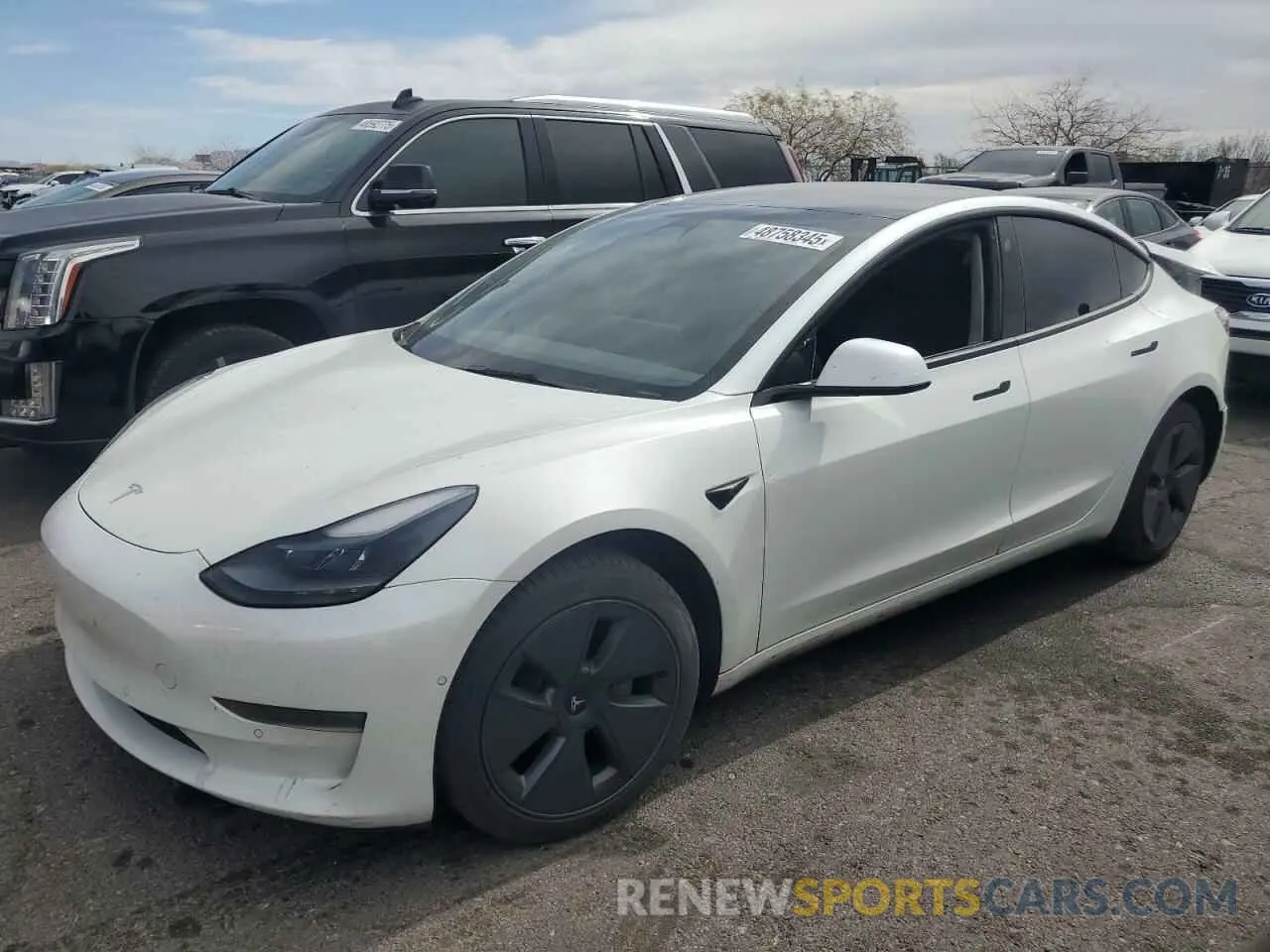 1 Photograph of a damaged car 5YJ3E1EB8NF169819 TESLA MODEL 3 2022