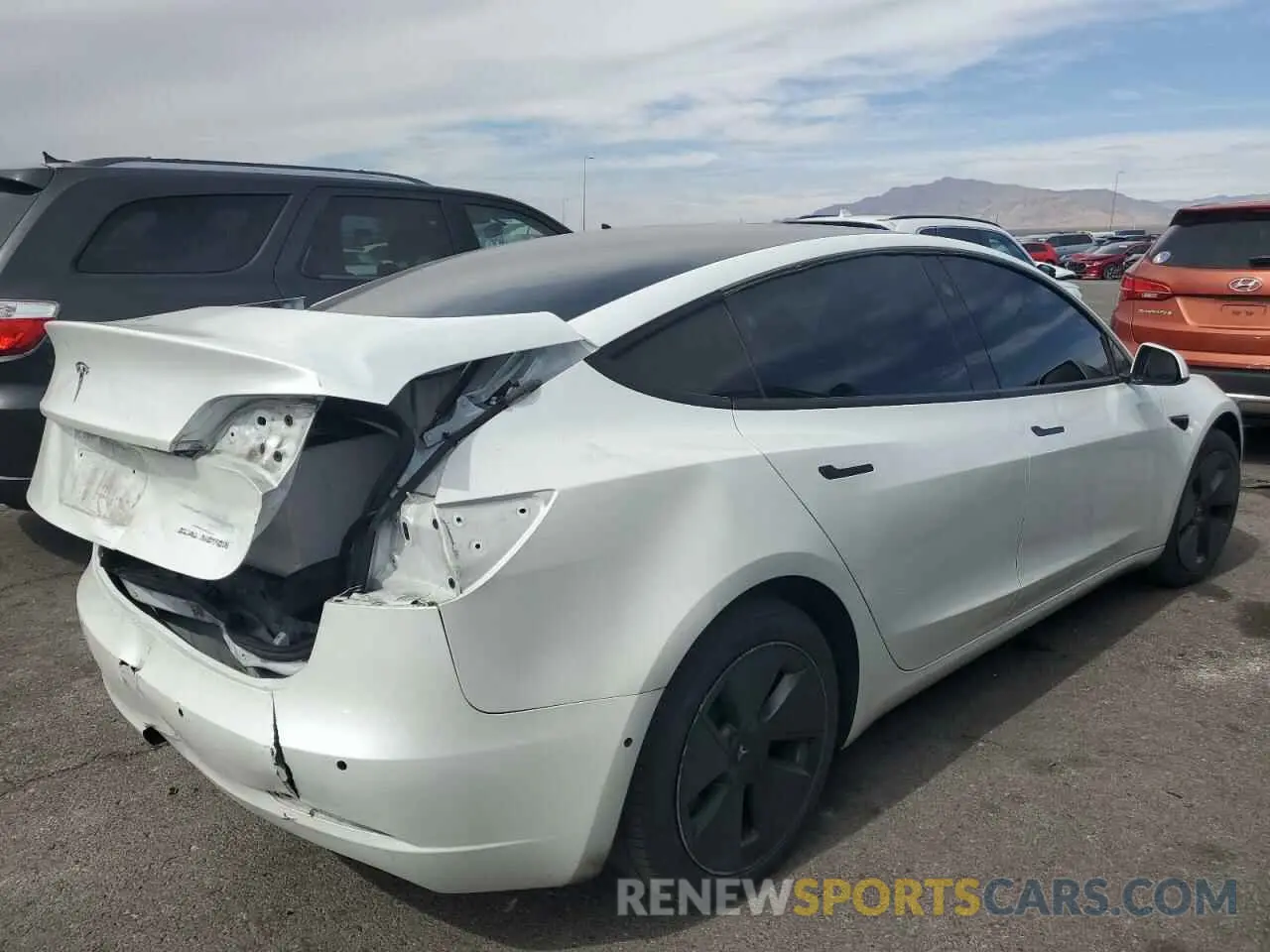 3 Photograph of a damaged car 5YJ3E1EB8NF169819 TESLA MODEL 3 2022