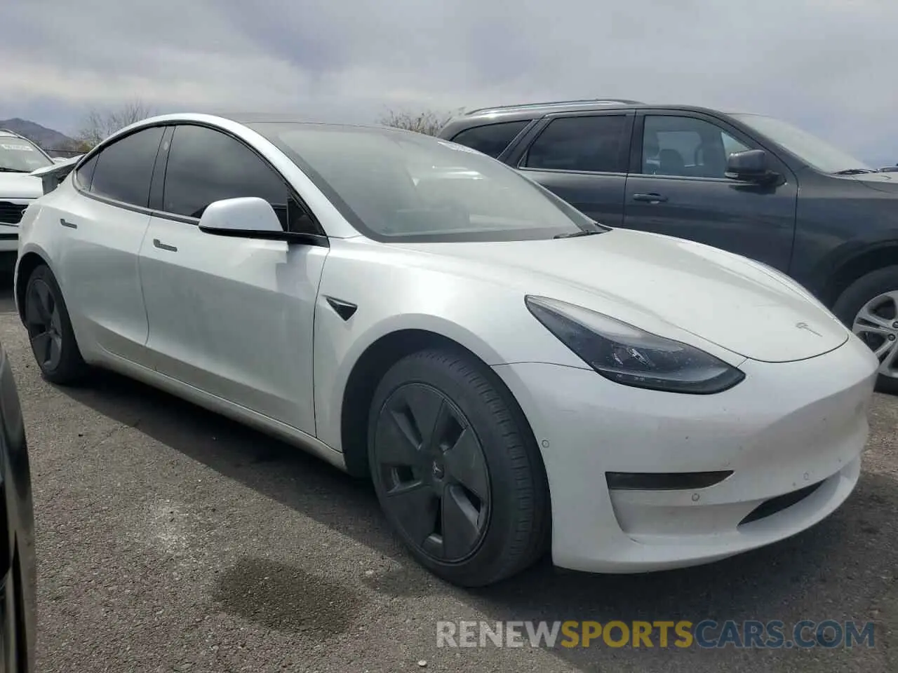 4 Photograph of a damaged car 5YJ3E1EB8NF169819 TESLA MODEL 3 2022