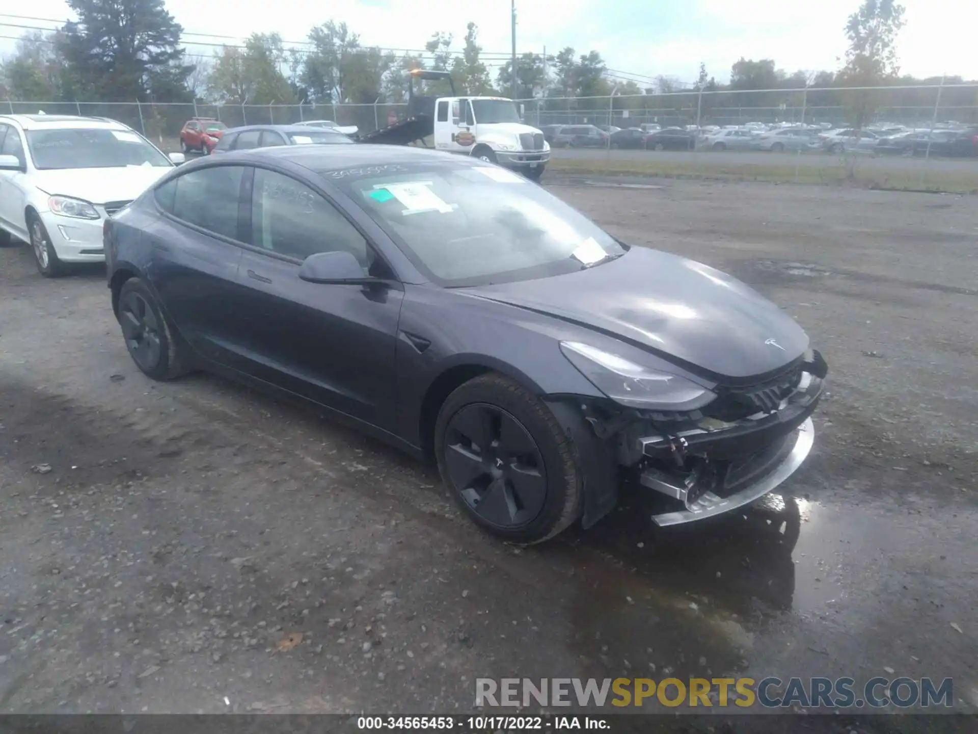 1 Photograph of a damaged car 5YJ3E1EB8NF173059 TESLA MODEL 3 2022