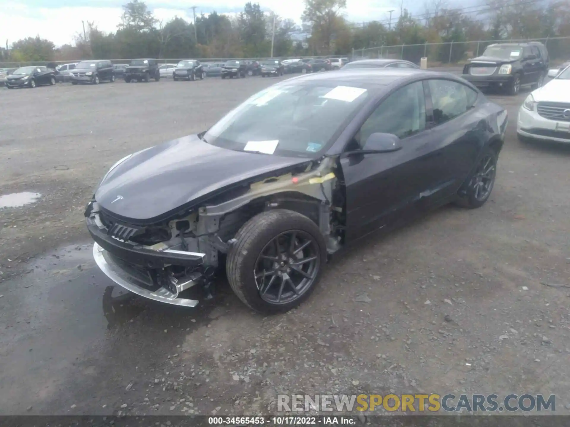 2 Photograph of a damaged car 5YJ3E1EB8NF173059 TESLA MODEL 3 2022