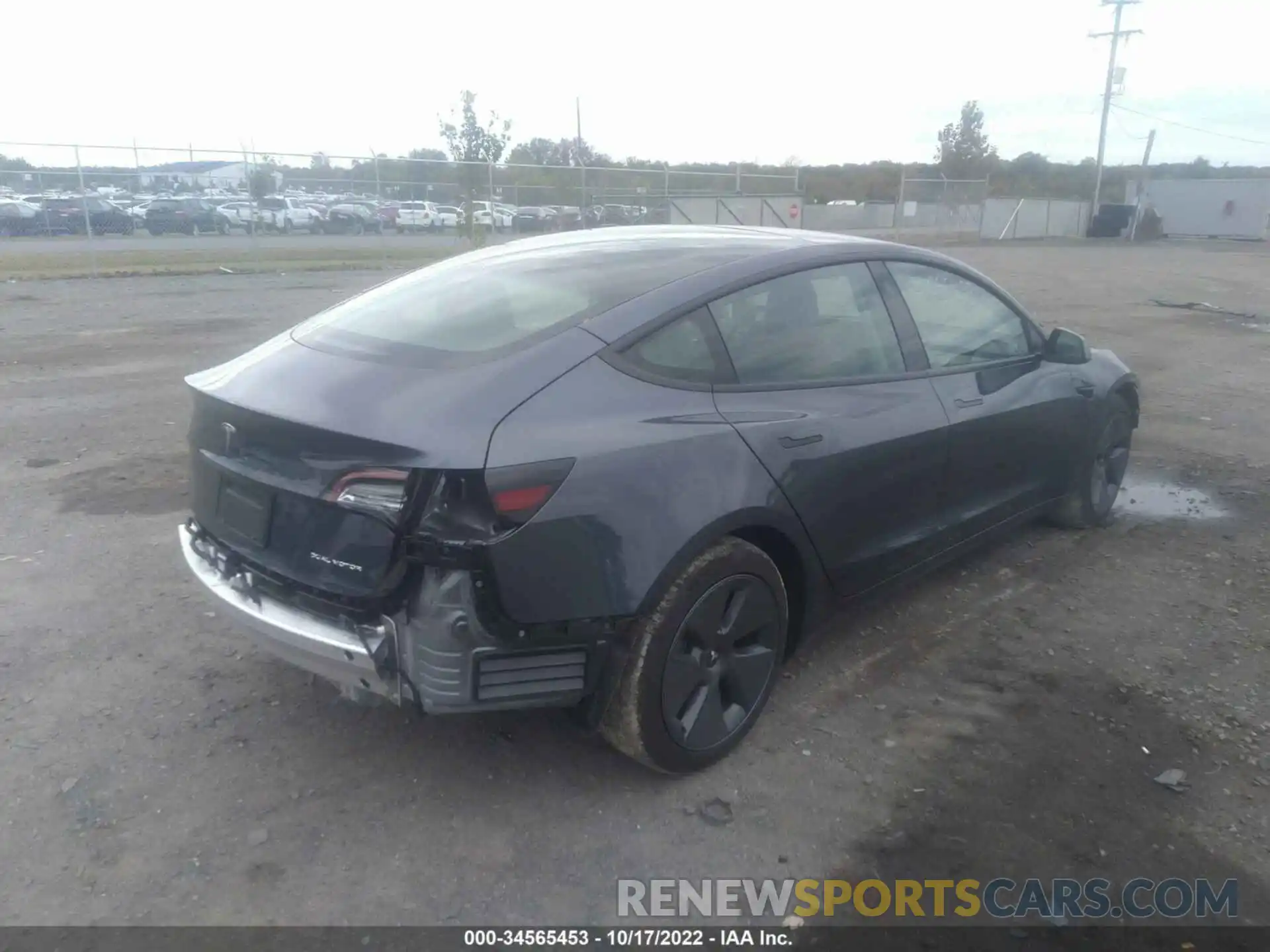 4 Photograph of a damaged car 5YJ3E1EB8NF173059 TESLA MODEL 3 2022