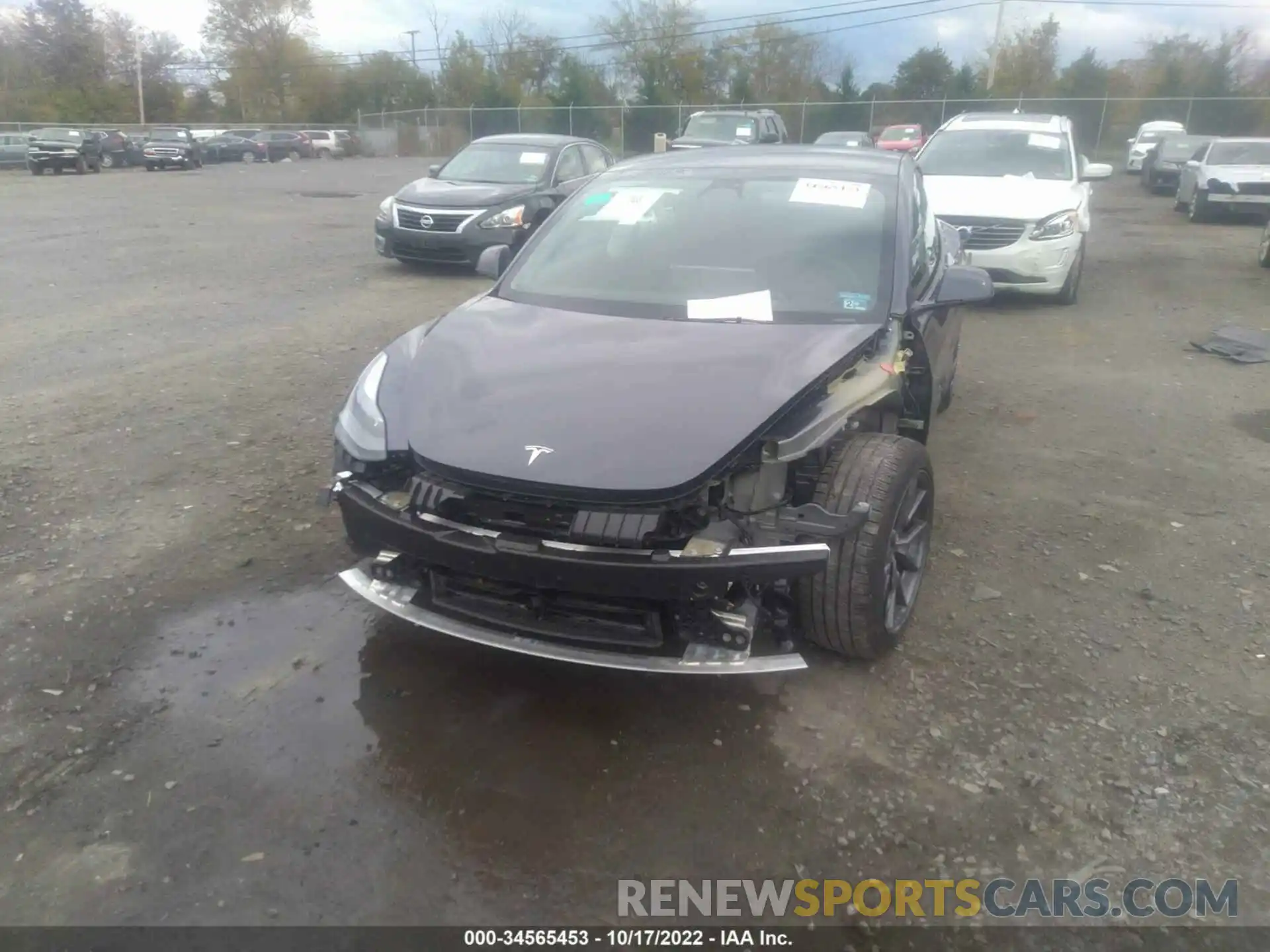 6 Photograph of a damaged car 5YJ3E1EB8NF173059 TESLA MODEL 3 2022