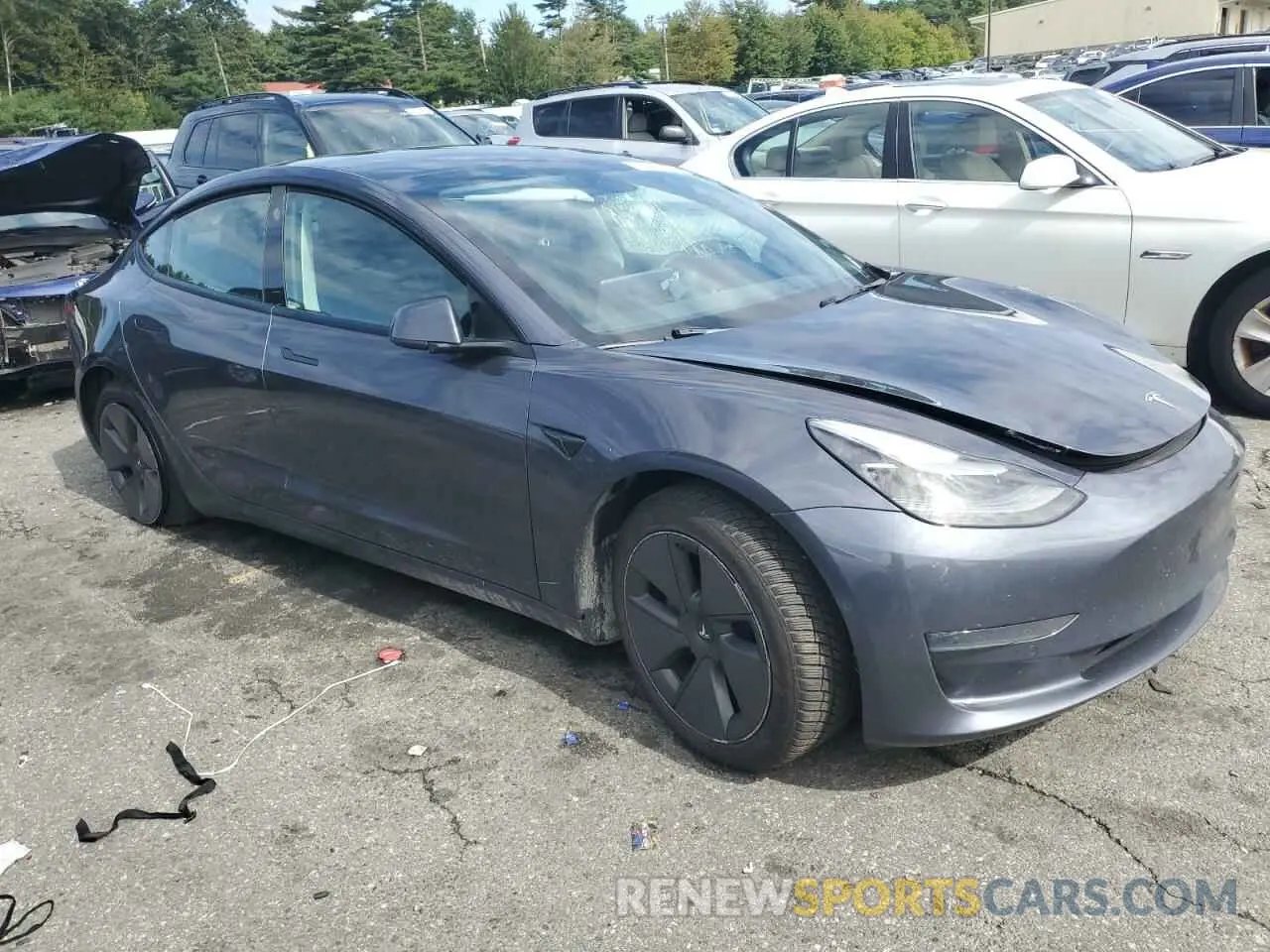 4 Photograph of a damaged car 5YJ3E1EB8NF182876 TESLA MODEL 3 2022