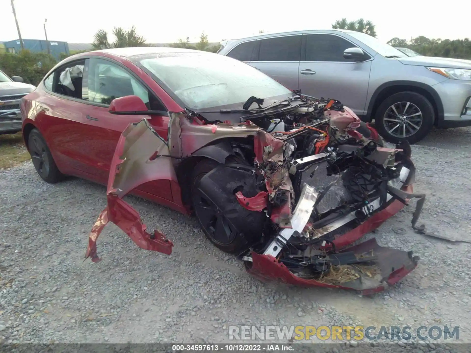 1 Photograph of a damaged car 5YJ3E1EB8NF184000 TESLA MODEL 3 2022