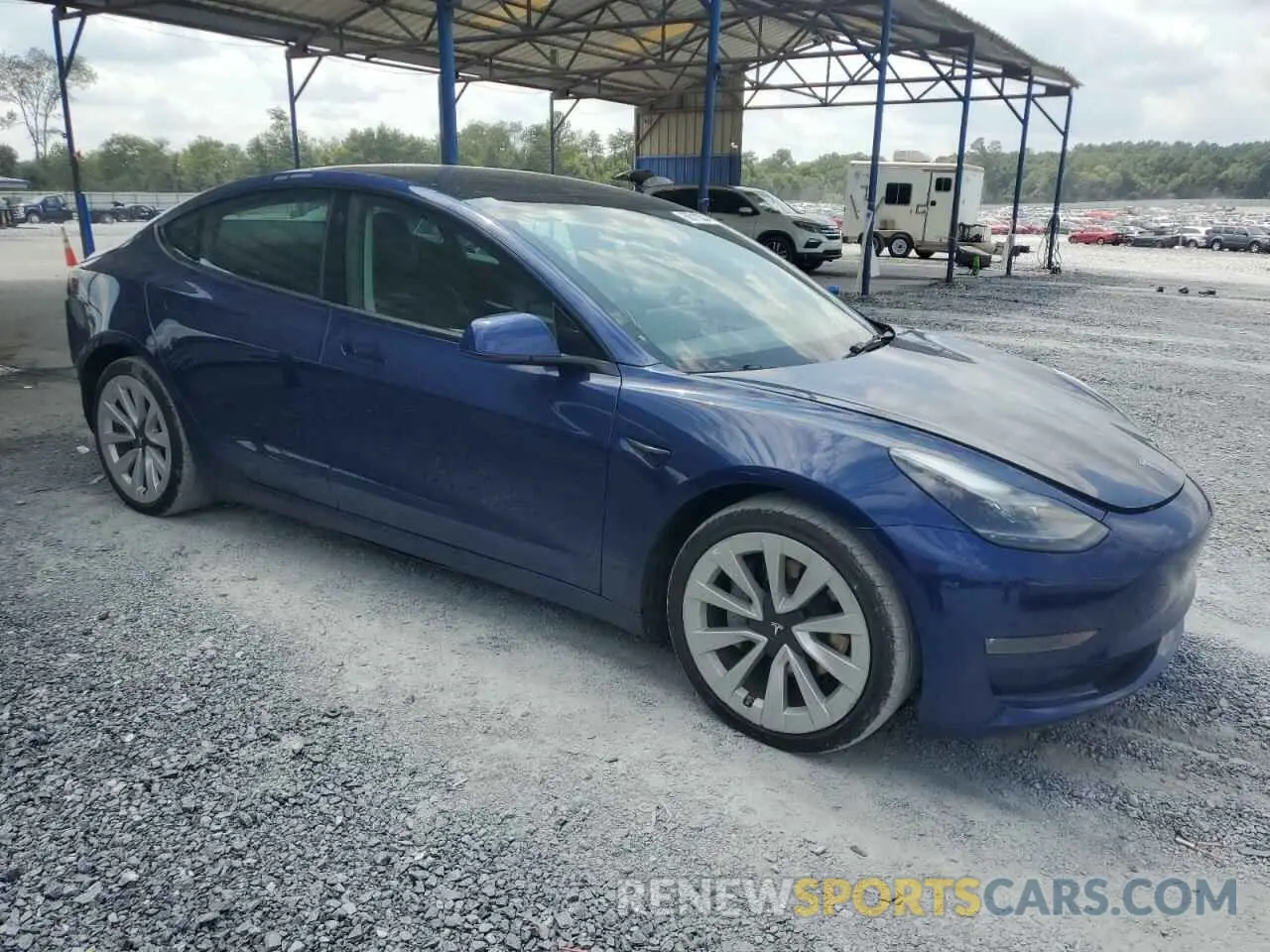 4 Photograph of a damaged car 5YJ3E1EB8NF188029 TESLA MODEL 3 2022