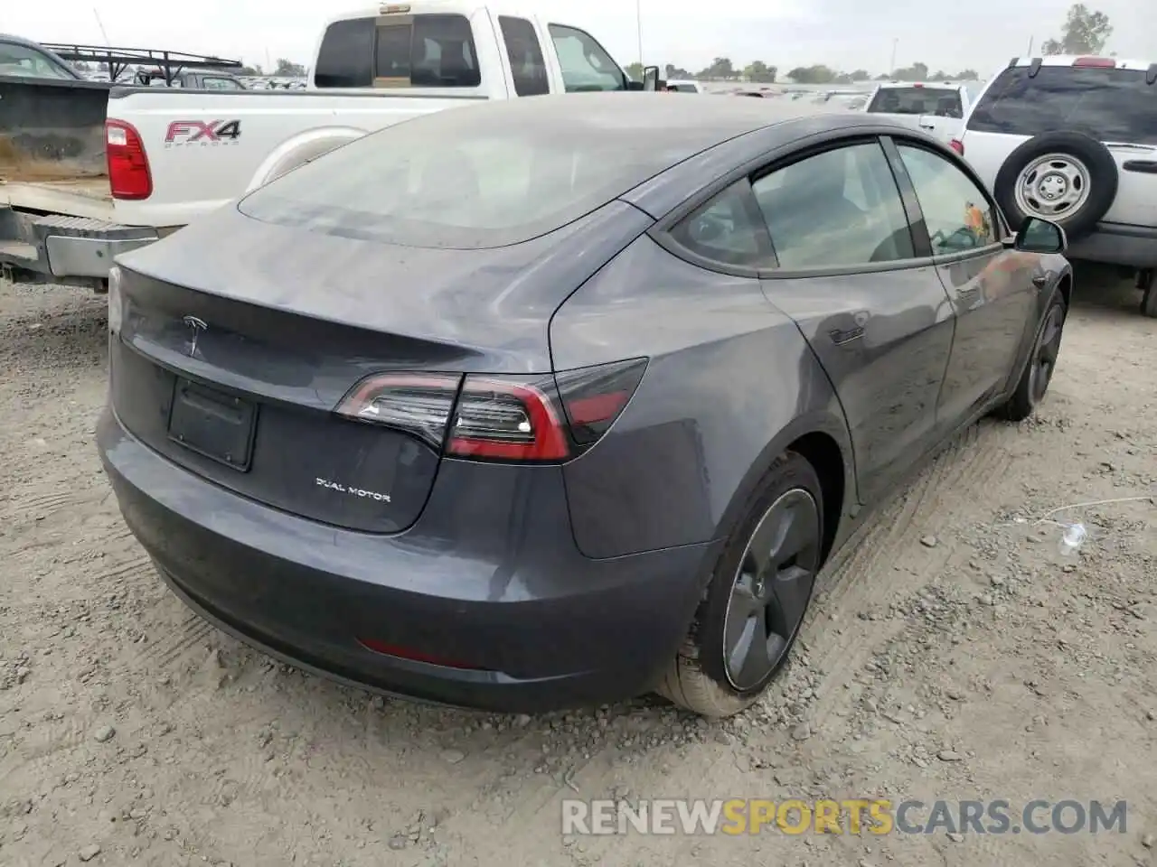 4 Photograph of a damaged car 5YJ3E1EB8NF188497 TESLA MODEL 3 2022