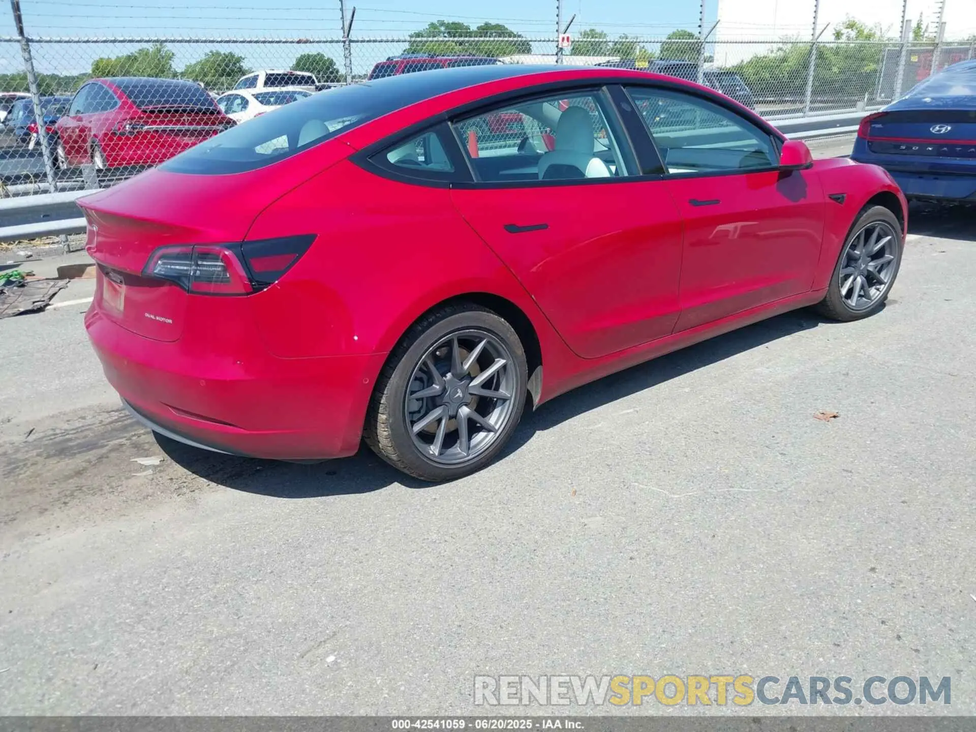 4 Photograph of a damaged car 5YJ3E1EB8NF199712 TESLA MODEL 3 2022