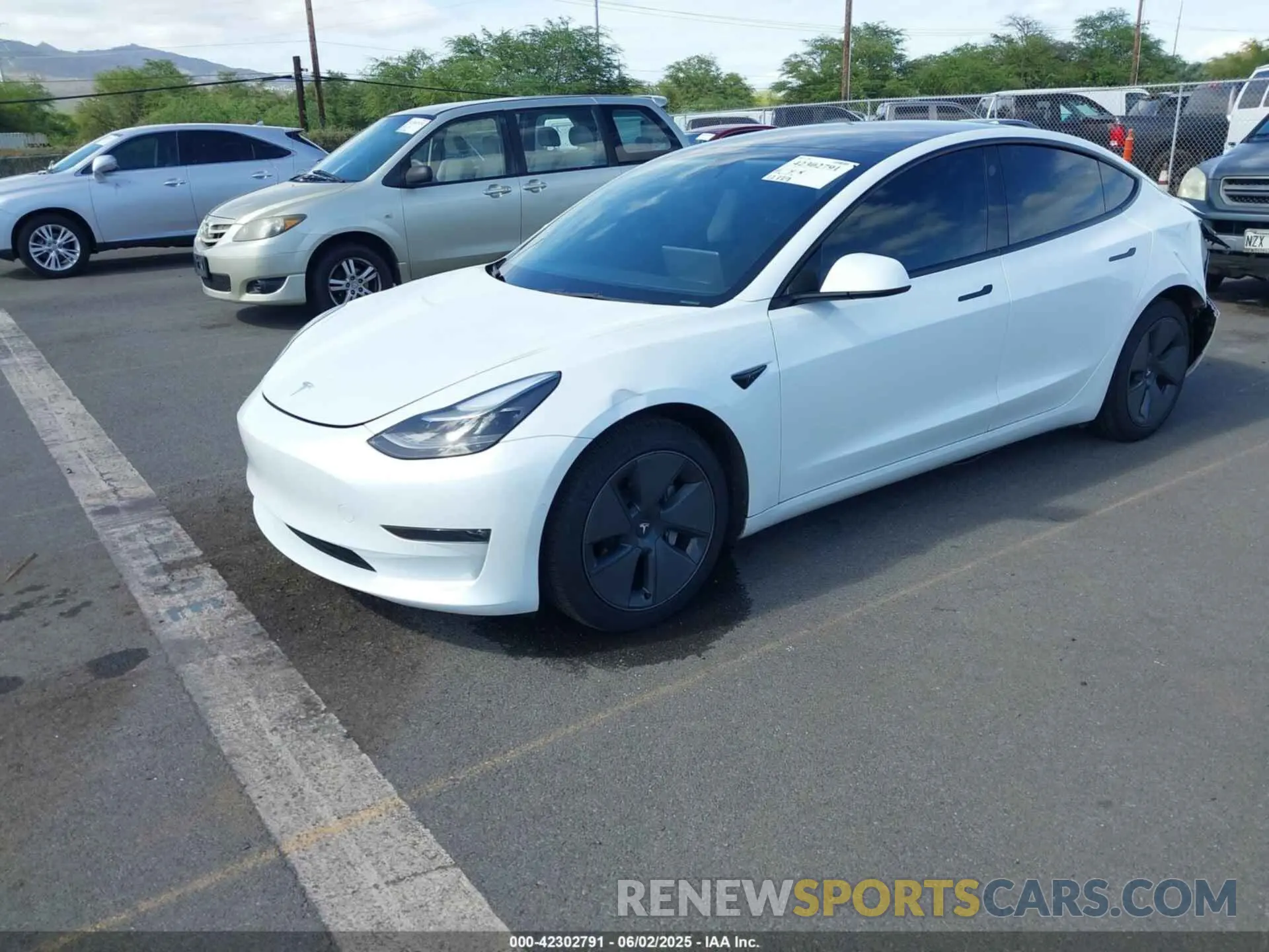 2 Photograph of a damaged car 5YJ3E1EB8NF232479 TESLA MODEL 3 2022