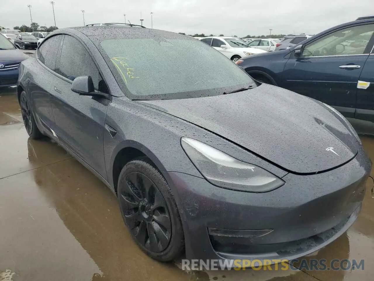 4 Photograph of a damaged car 5YJ3E1EB8NF248763 TESLA MODEL 3 2022
