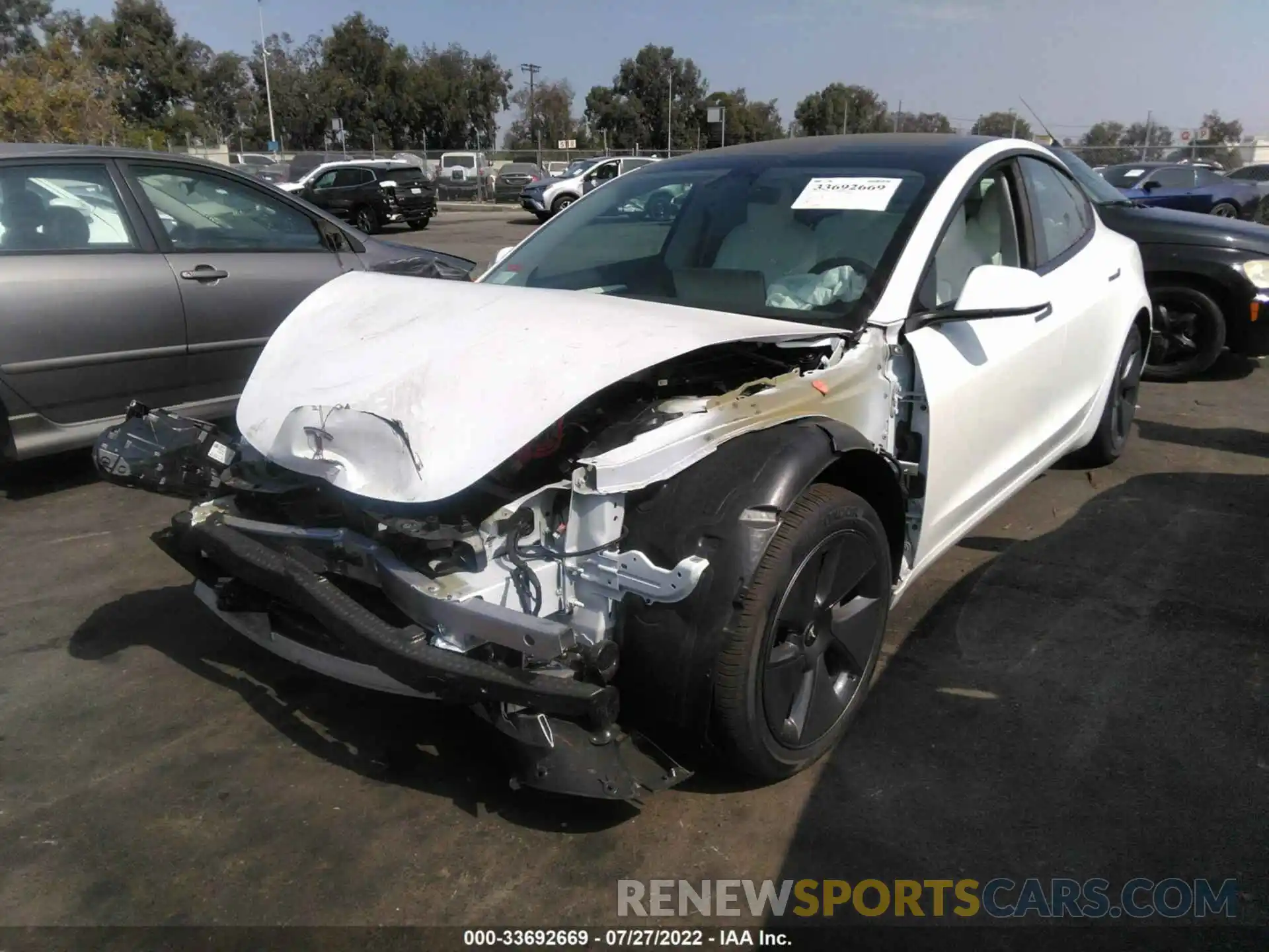 2 Photograph of a damaged car 5YJ3E1EB8NF251999 TESLA MODEL 3 2022