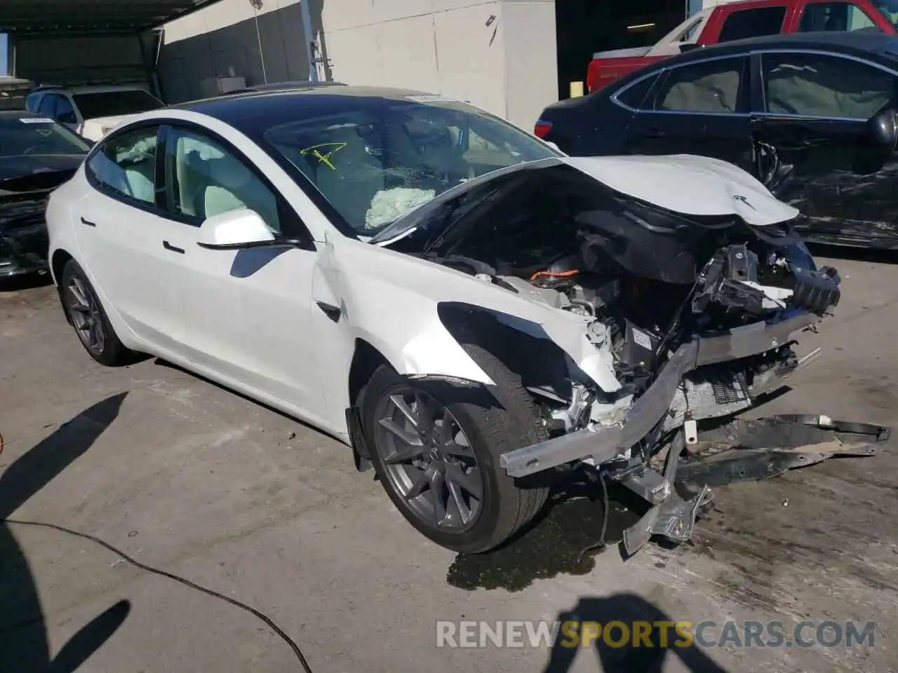 1 Photograph of a damaged car 5YJ3E1EB8NF253865 TESLA MODEL 3 2022