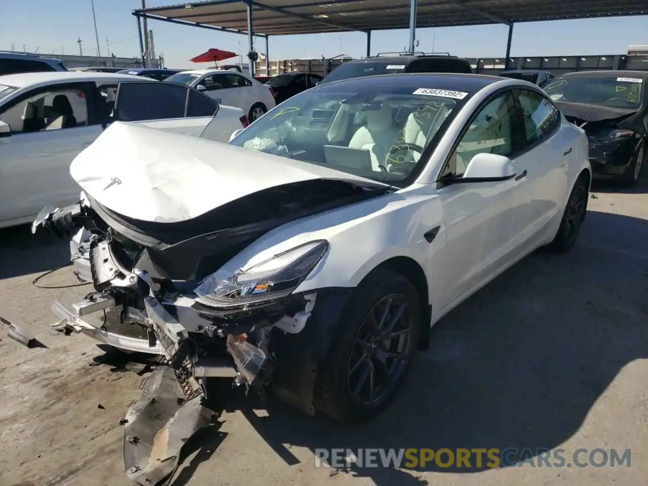 2 Photograph of a damaged car 5YJ3E1EB8NF253865 TESLA MODEL 3 2022