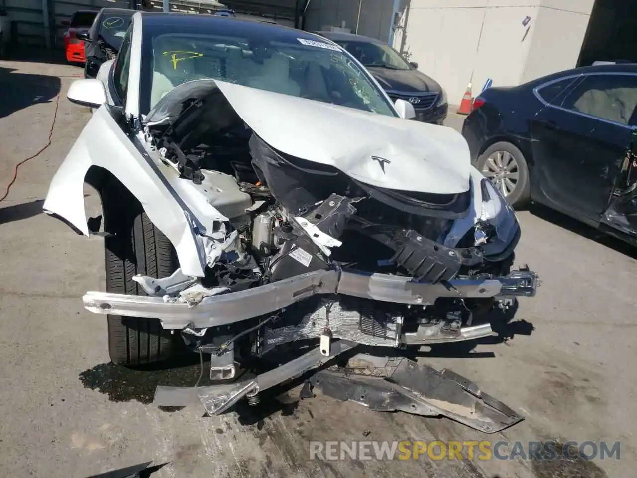 9 Photograph of a damaged car 5YJ3E1EB8NF253865 TESLA MODEL 3 2022