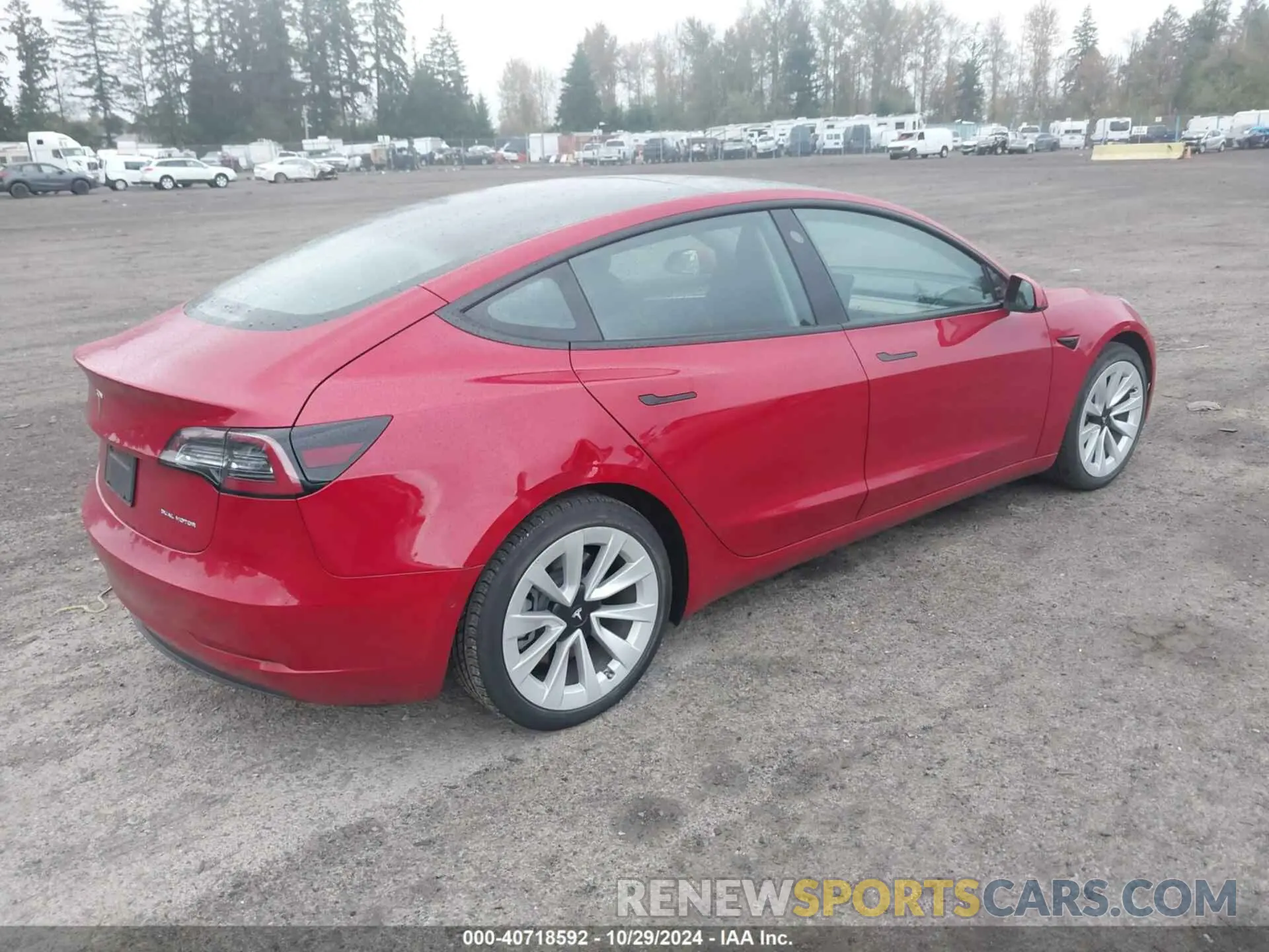 4 Photograph of a damaged car 5YJ3E1EB8NF273081 TESLA MODEL 3 2022