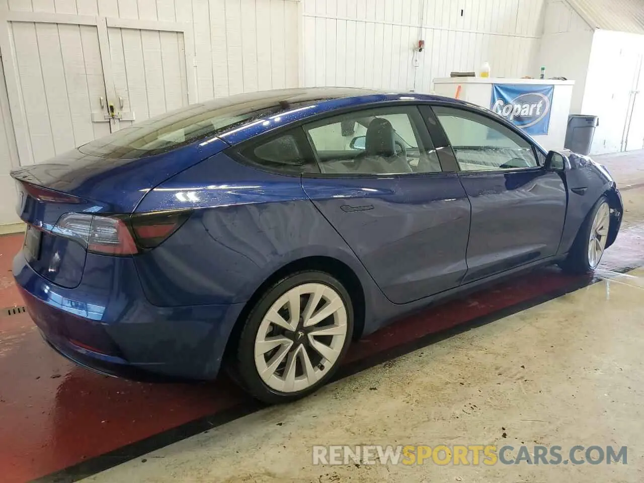 3 Photograph of a damaged car 5YJ3E1EB8NF305110 TESLA MODEL 3 2022