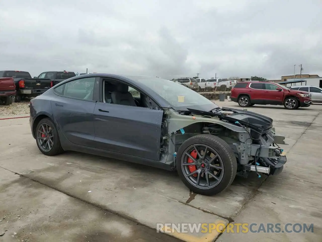 4 Photograph of a damaged car 5YJ3E1EB8NF325597 TESLA MODEL 3 2022