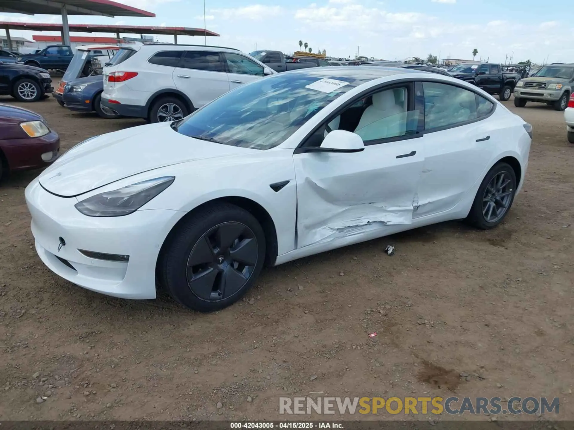 2 Photograph of a damaged car 5YJ3E1EB8NF338947 TESLA MODEL 3 2022