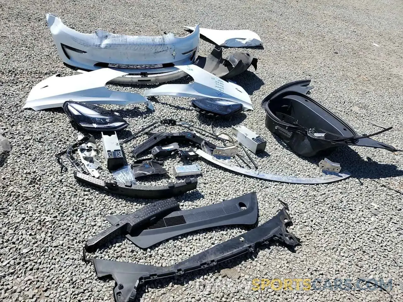 12 Photograph of a damaged car 5YJ3E1EB8NF340343 TESLA MODEL 3 2022