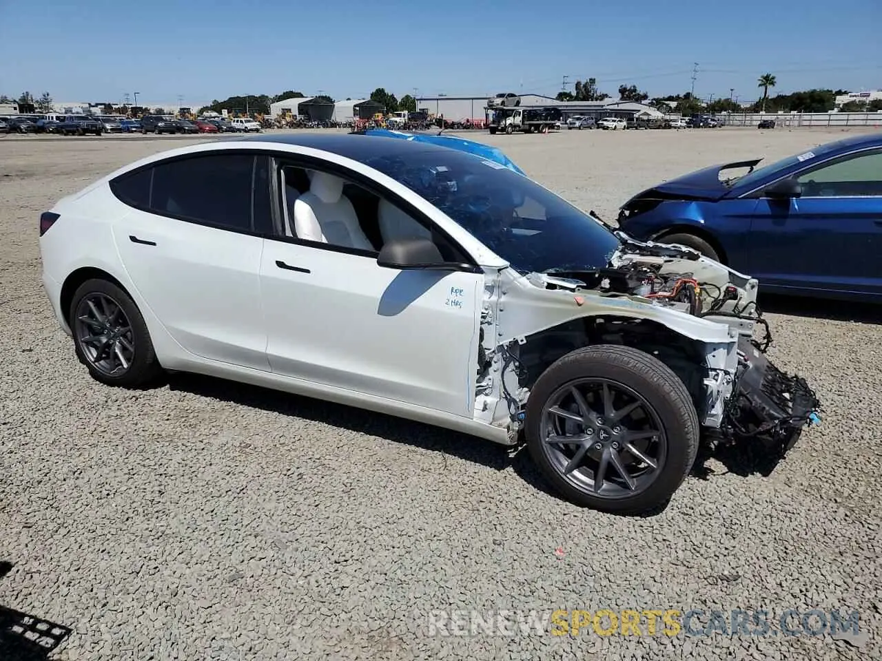 4 Photograph of a damaged car 5YJ3E1EB8NF340343 TESLA MODEL 3 2022