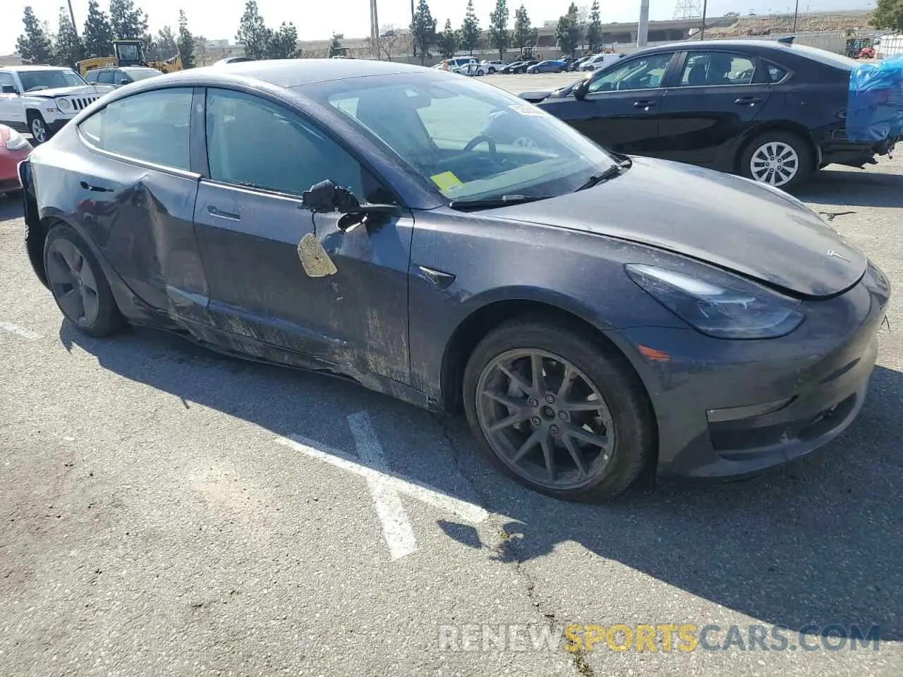 4 Photograph of a damaged car 5YJ3E1EB8NF341248 TESLA MODEL 3 2022