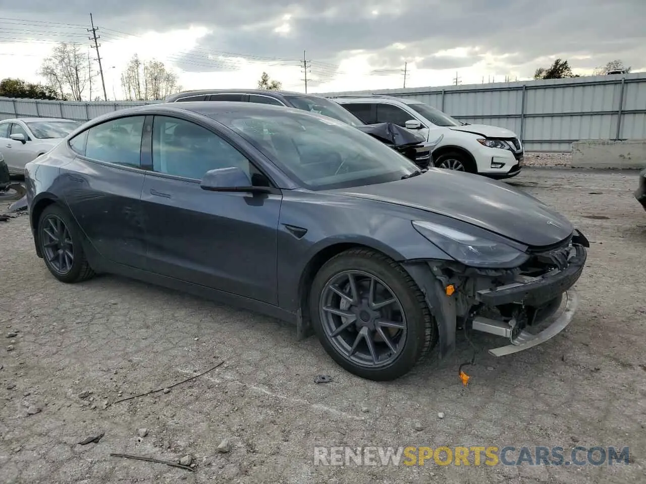 4 Photograph of a damaged car 5YJ3E1EB8NF344358 TESLA MODEL 3 2022