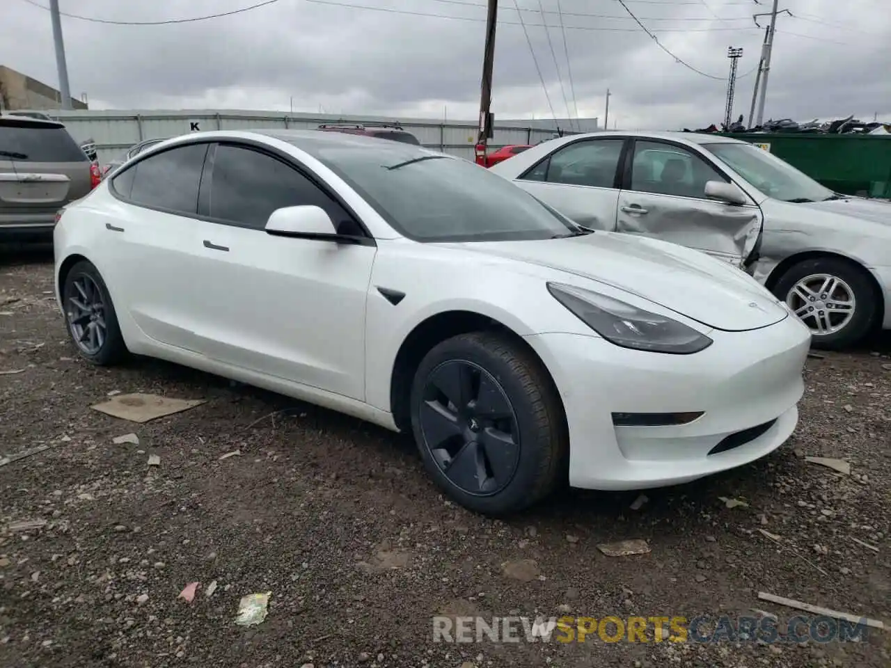 4 Photograph of a damaged car 5YJ3E1EB8NF354131 TESLA MODEL 3 2022