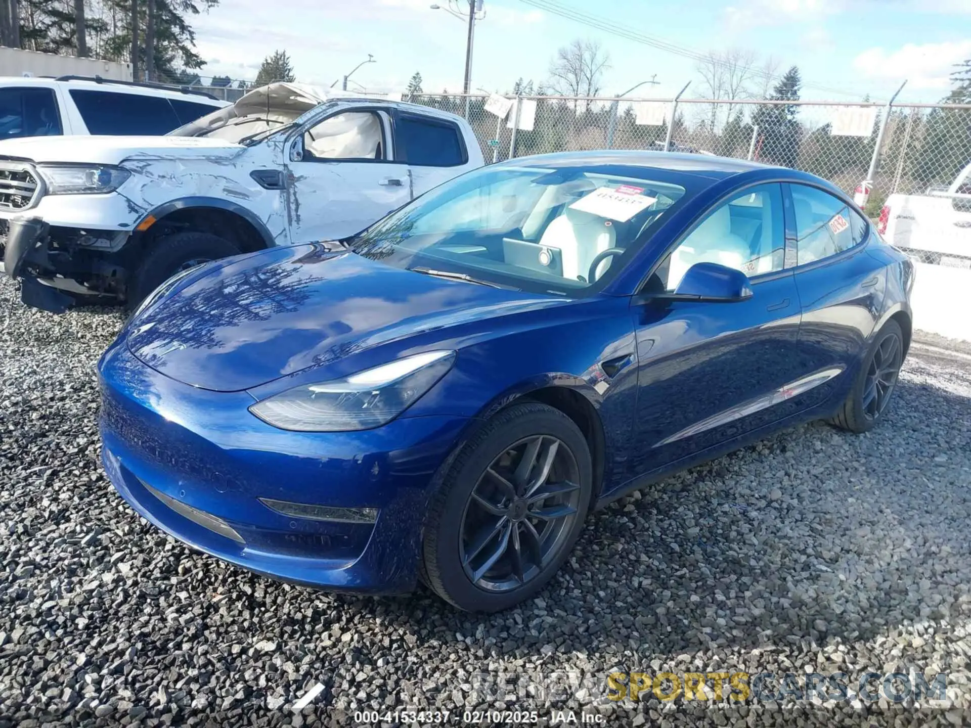 2 Photograph of a damaged car 5YJ3E1EB8NF363864 TESLA MODEL 3 2022