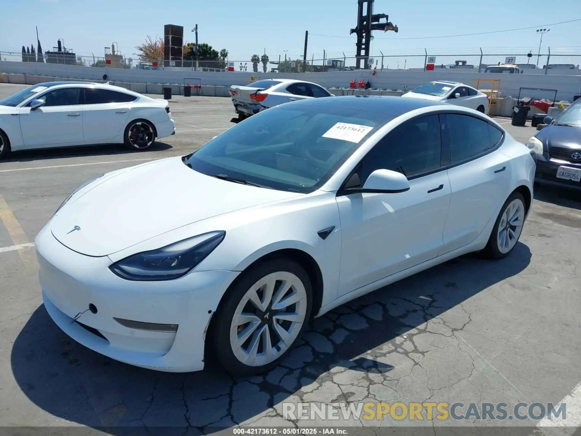 2 Photograph of a damaged car 5YJ3E1EB9NF113601 TESLA MODEL 3 2022