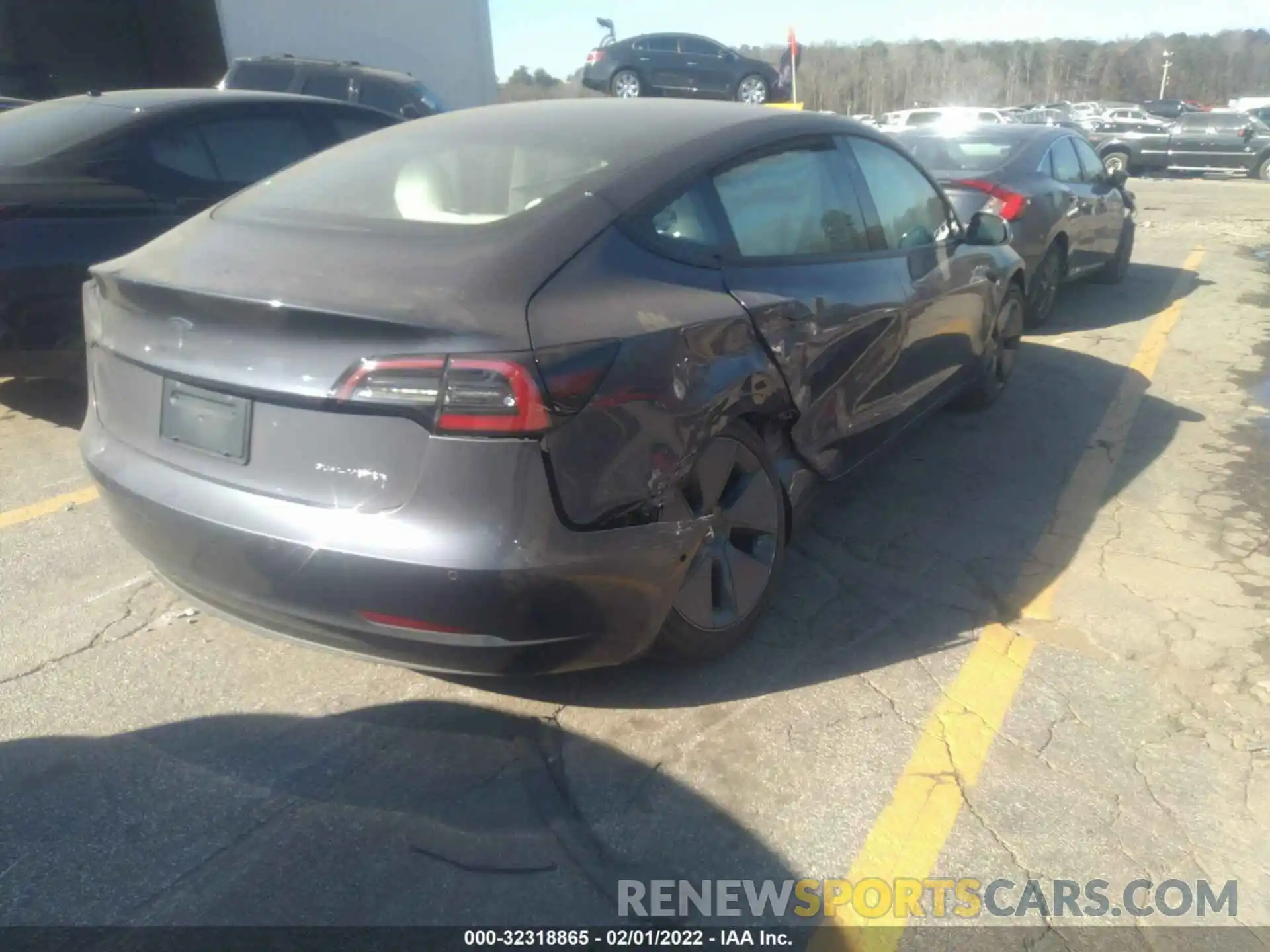 4 Photograph of a damaged car 5YJ3E1EB9NF115090 TESLA MODEL 3 2022