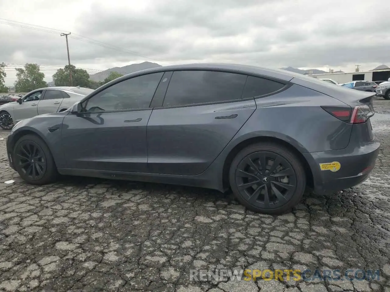 2 Photograph of a damaged car 5YJ3E1EB9NF117339 TESLA MODEL 3 2022
