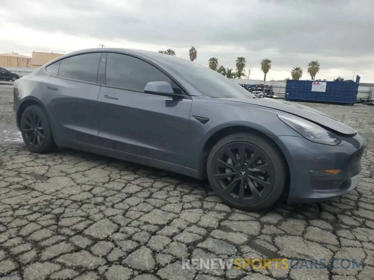 4 Photograph of a damaged car 5YJ3E1EB9NF117339 TESLA MODEL 3 2022