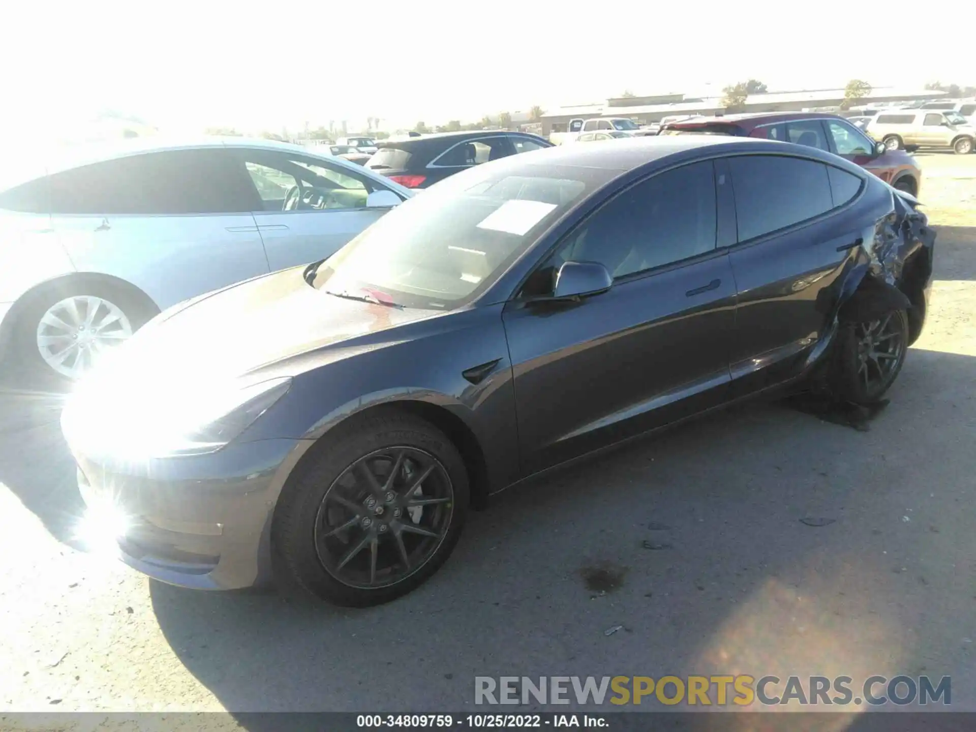 2 Photograph of a damaged car 5YJ3E1EB9NF124775 TESLA MODEL 3 2022