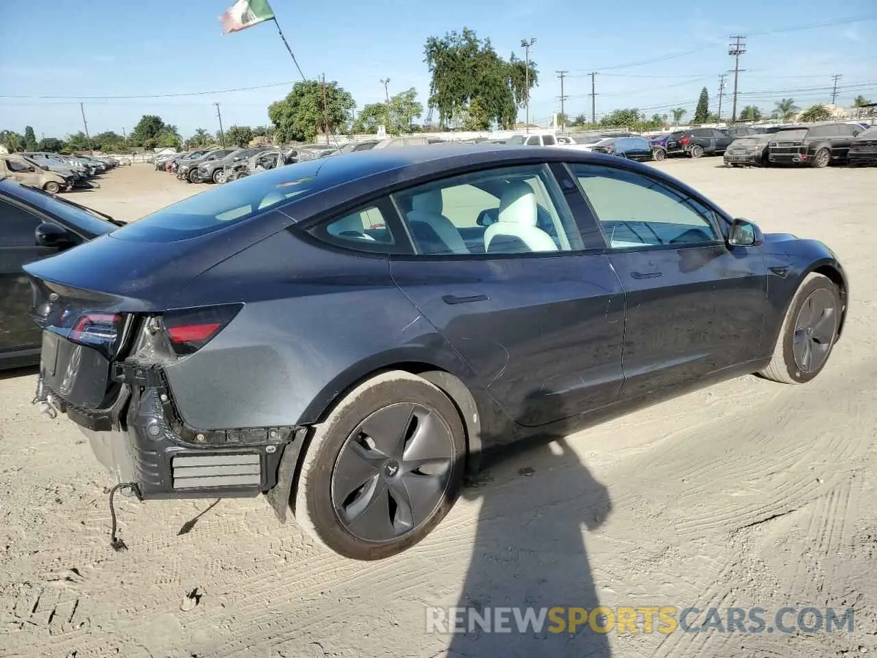 3 Photograph of a damaged car 5YJ3E1EB9NF128356 TESLA MODEL 3 2022