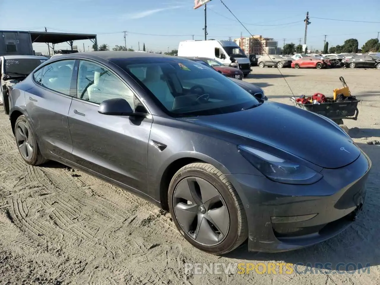 4 Photograph of a damaged car 5YJ3E1EB9NF128356 TESLA MODEL 3 2022