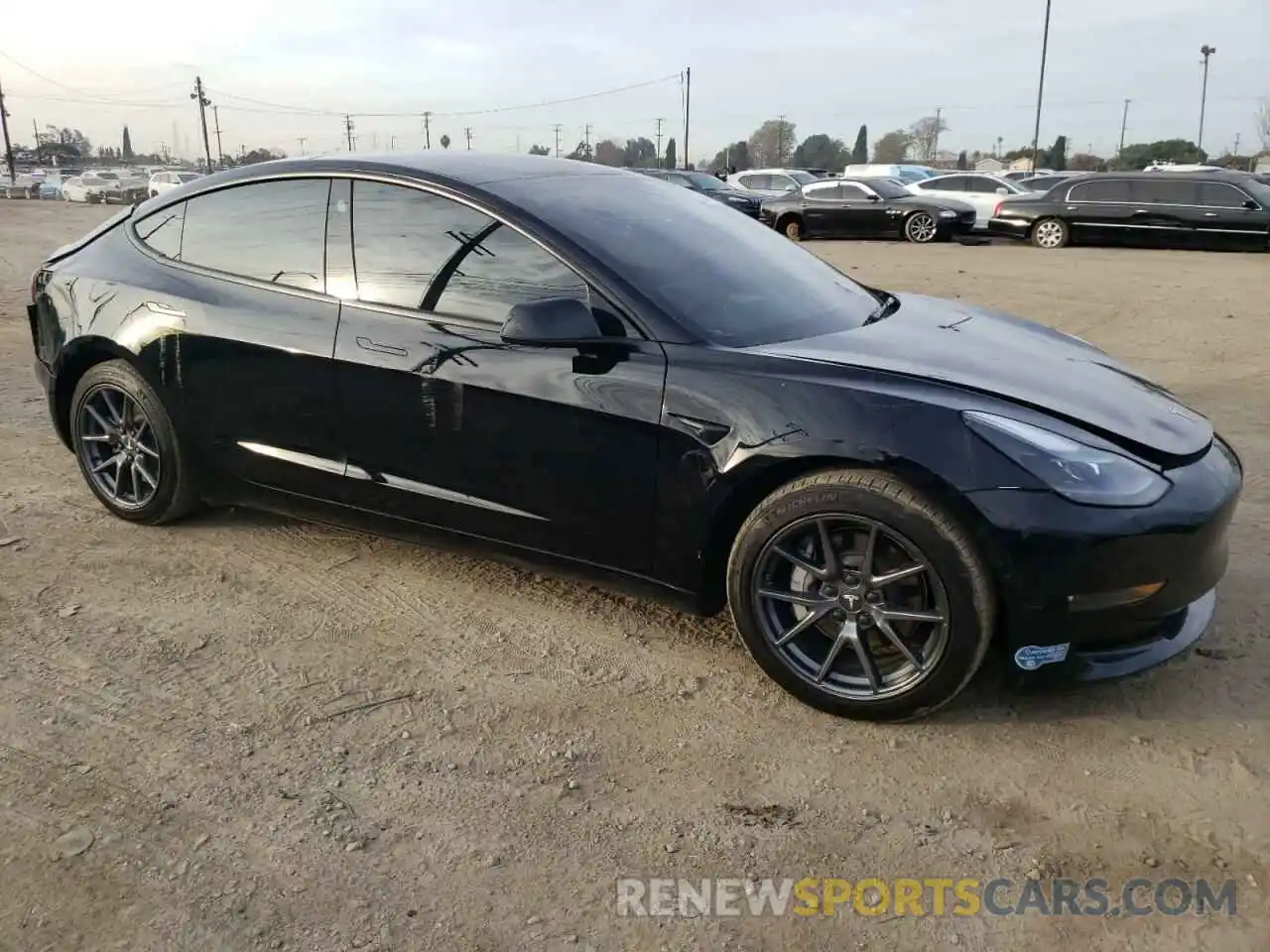 4 Photograph of a damaged car 5YJ3E1EB9NF130821 TESLA MODEL 3 2022