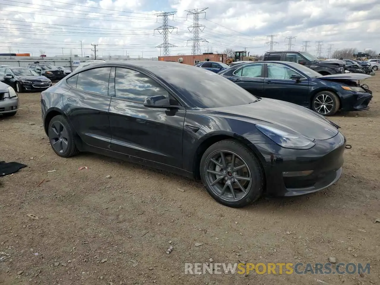 4 Photograph of a damaged car 5YJ3E1EB9NF134819 TESLA MODEL 3 2022