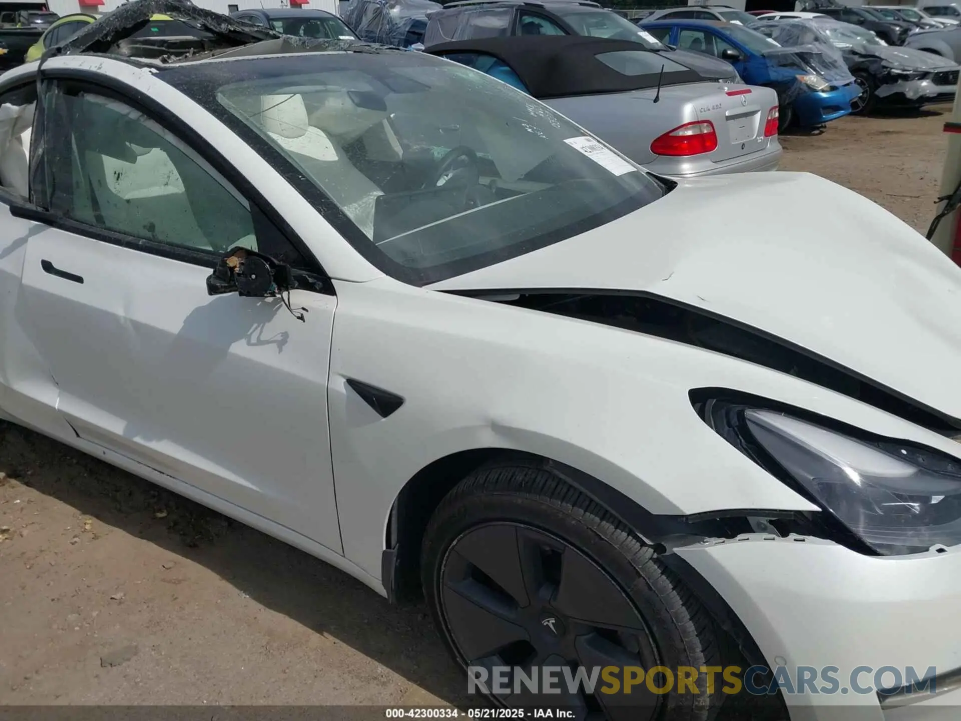 11 Photograph of a damaged car 5YJ3E1EB9NF155394 TESLA MODEL 3 2022