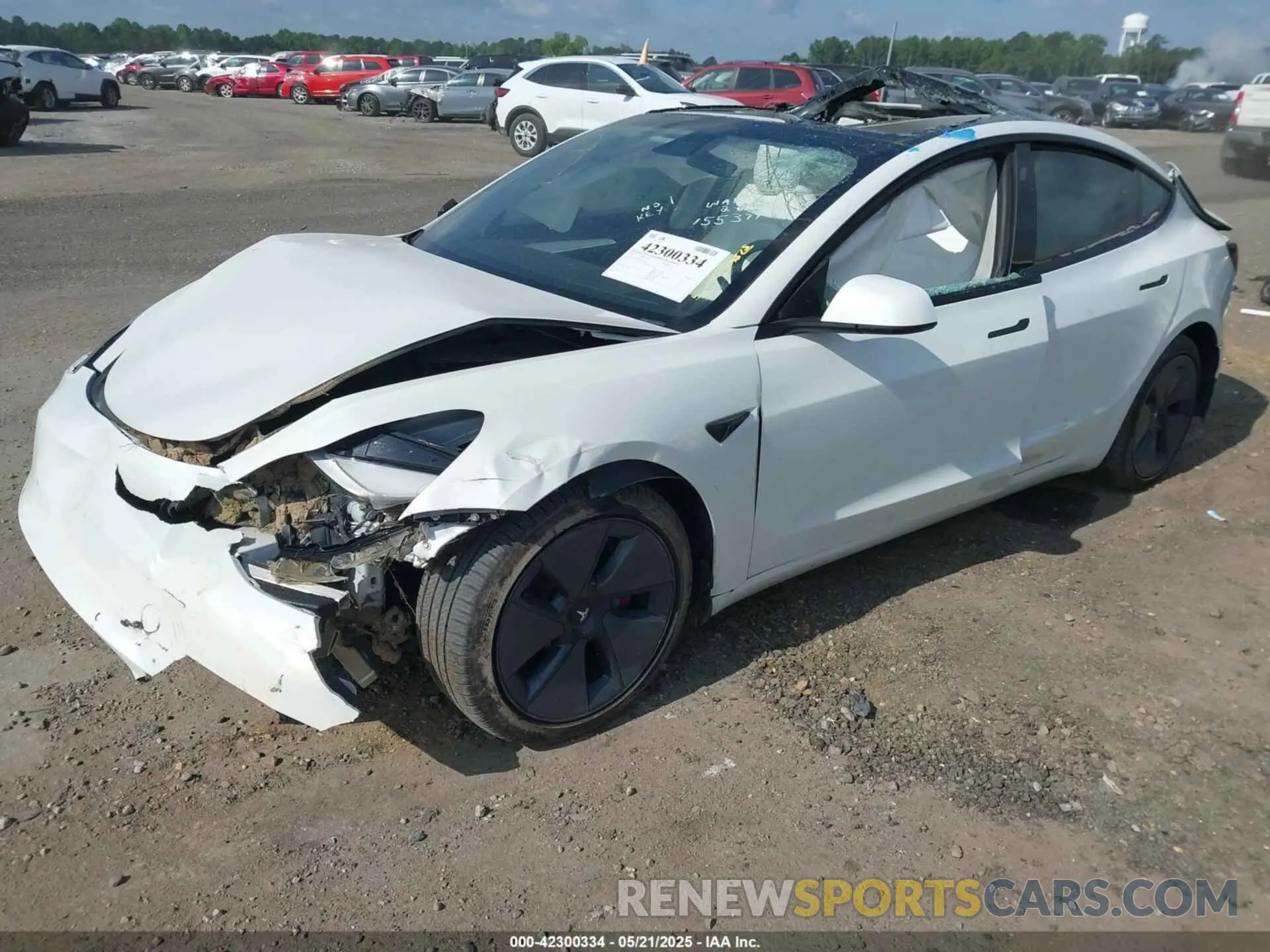 2 Photograph of a damaged car 5YJ3E1EB9NF155394 TESLA MODEL 3 2022