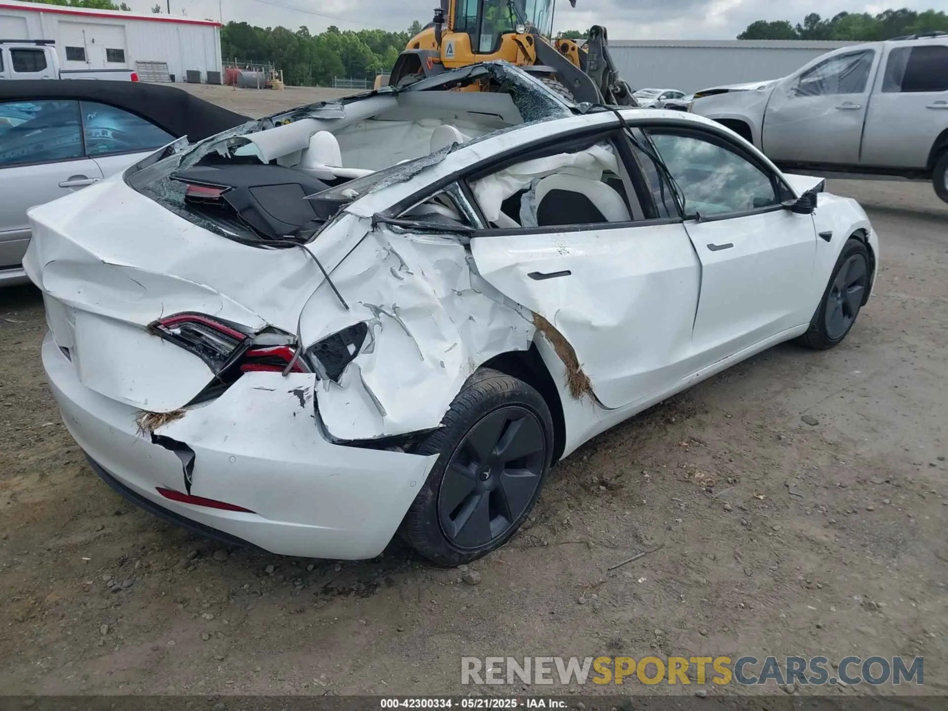 4 Photograph of a damaged car 5YJ3E1EB9NF155394 TESLA MODEL 3 2022